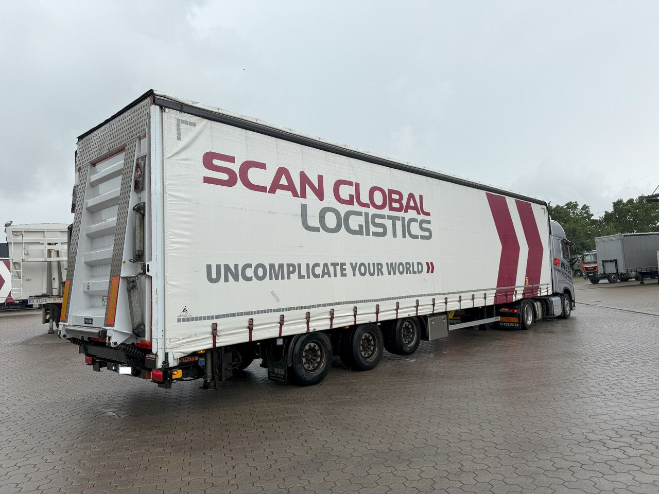 Wiese Mega Schiebeplane mit Dhollandia Rampe 9t - Низкорамный полуприцеп: фото 2 Wiese Mega Schiebeplane mit Dhollandia Rampe 9t - Низкорамный полуприцеп: фото 2