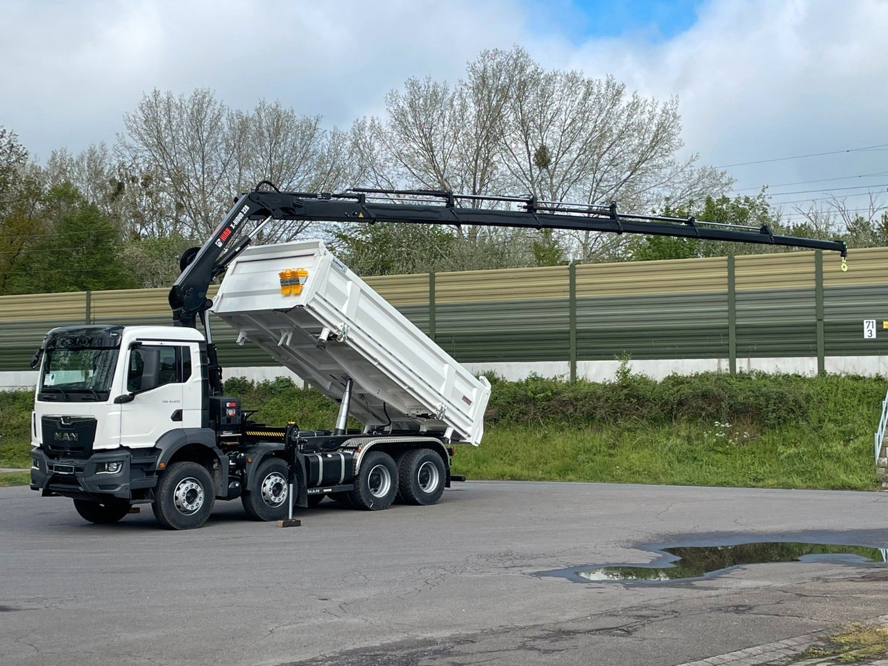 MAN TGS 41.480 8x4/Euro6e Euromix Kipper Hiab 228-6 - Самосвал, Автоманипулятор: фото 1 MAN TGS 41.480 8x4/Euro6e Euromix Kipper Hiab 228-6 - Самосвал, Автоманипулятор: фото 1