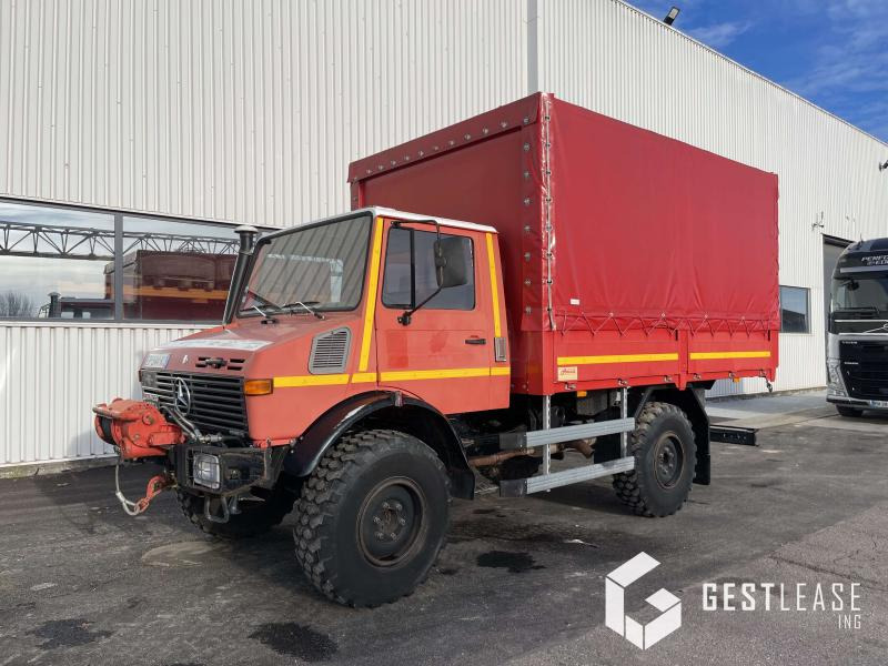 Mercedes UNIMOG 1550 L - Тентованный грузовик: фото 1 Mercedes UNIMOG 1550 L - Тентованный грузовик: фото 1