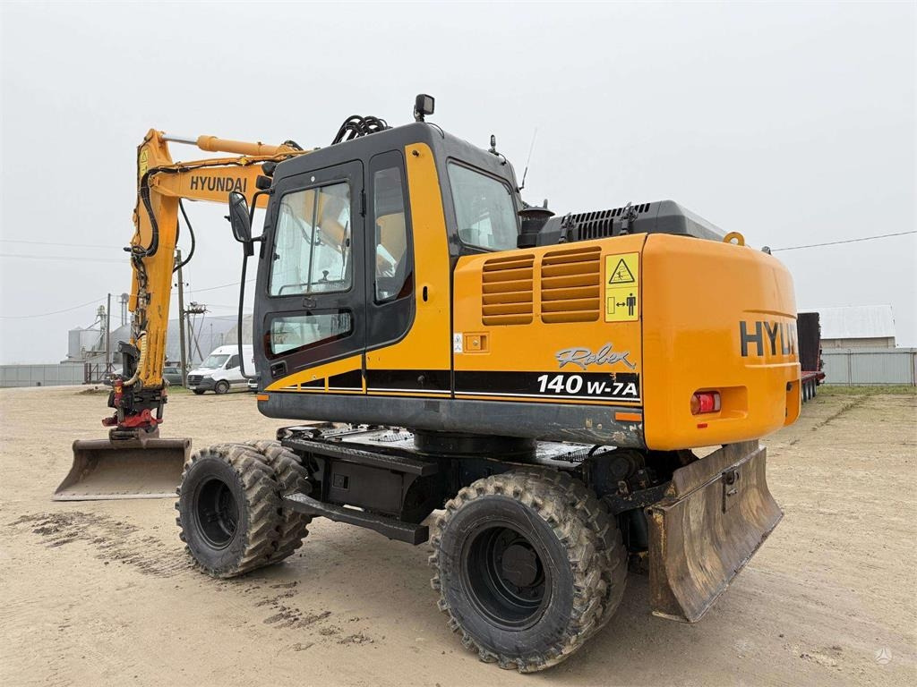 Hyundai Robex 140 W-7A ROTOTILT - Колёсный экскаватор: фото 4 Hyundai Robex 140 W-7A ROTOTILT - Колёсный экскаватор: фото 4