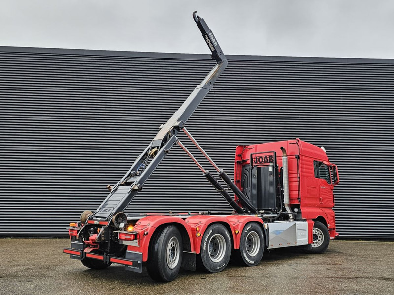 MAN TGX 35.500 / 8x4-4 / ABROLL-KIPPER / HOOKLIFT - Крюковой мультилифт: фото 4 MAN TGX 35.500 / 8x4-4 / ABROLL-KIPPER / HOOKLIFT - Крюковой мультилифт: фото 4