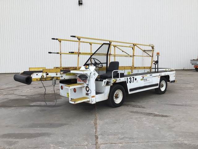 Tug T660-1 - Ленточный погрузчик багажа: фото 1 Tug T660-1 - Ленточный погрузчик багажа: фото 1