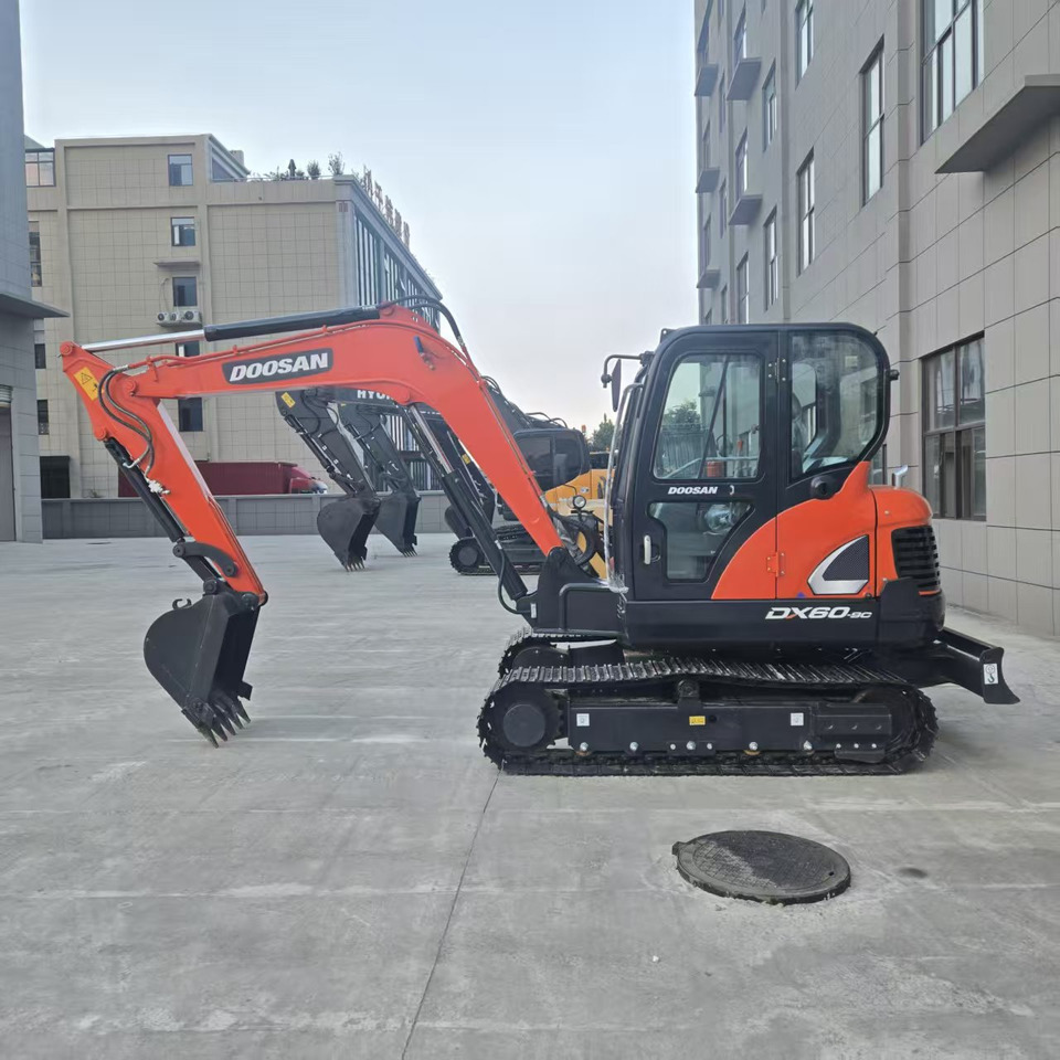 Doosan DX60 - Мини-экскаватор: фото 1 Doosan DX60 - Мини-экскаватор: фото 1