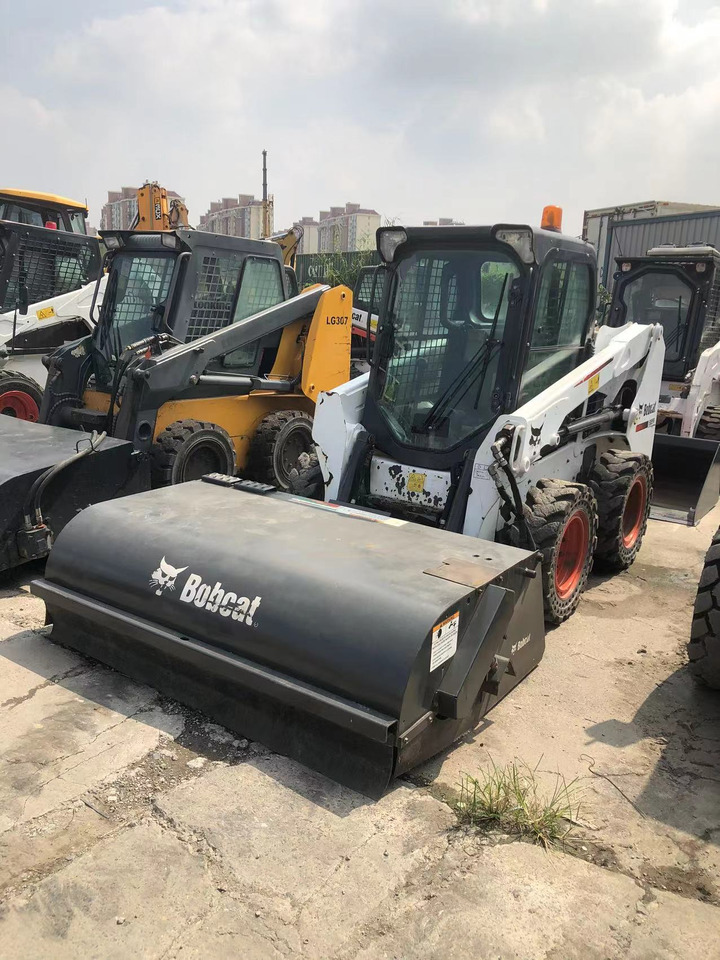 BOBCAT S550 - Мини-погрузчик с бортовым поворотом: фото 1 BOBCAT S550 - Мини-погрузчик с бортовым поворотом: фото 1