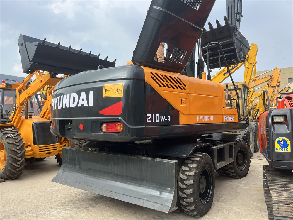HYUNDAI ROBEX 210W-9S - Колёсный экскаватор: фото 2 HYUNDAI ROBEX 210W-9S - Колёсный экскаватор: фото 2
