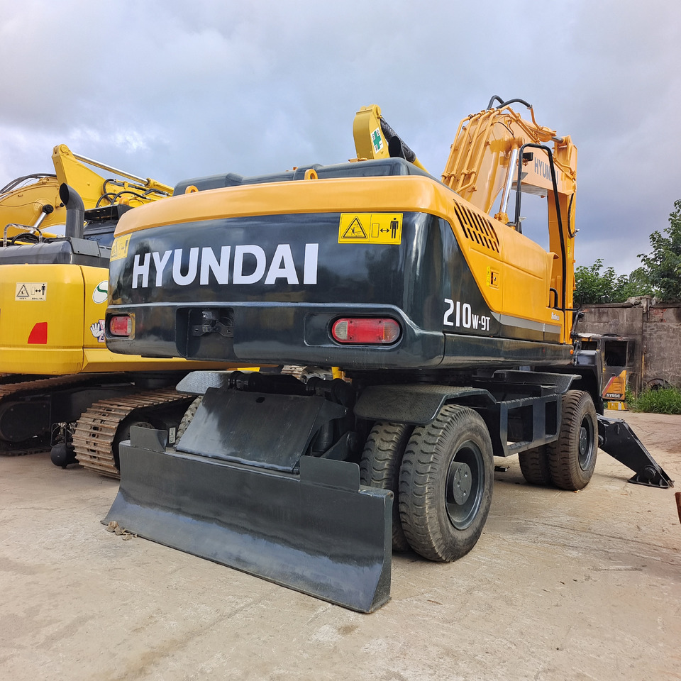 HYUNDAI ROBEX 210W-9T 210W-9 S - Колёсный экскаватор: фото 1 HYUNDAI ROBEX 210W-9T 210W-9 S - Колёсный экскаватор: фото 1