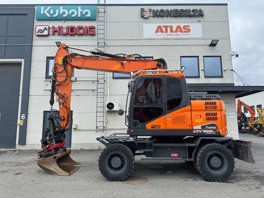 Doosan DX 165 W-5 - Колёсный экскаватор: фото 1 Doosan DX 165 W-5 - Колёсный экскаватор: фото 1