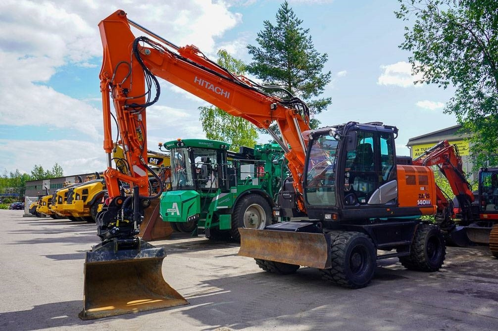 Hitachi ZX 140 W-6 - Колёсный экскаватор: фото 2 Hitachi ZX 140 W-6 - Колёсный экскаватор: фото 2
