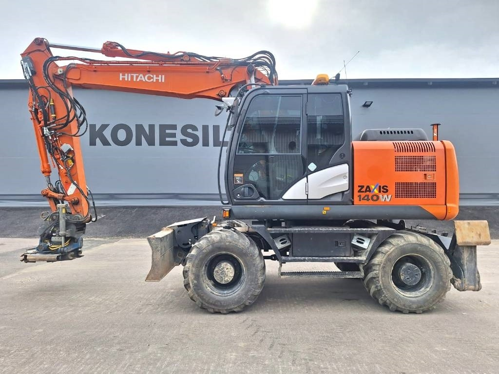 Hitachi ZX140W-5 HUIPPUVARUSTEET - Колёсный экскаватор: фото 1 Hitachi ZX140W-5 HUIPPUVARUSTEET - Колёсный экскаватор: фото 1