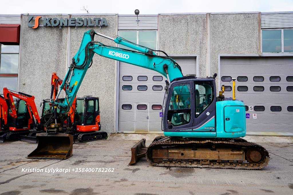 Kobelco SK140SRLC-3 DOZER 3D  - Гусеничный экскаватор: фото 1 Kobelco SK140SRLC-3 DOZER 3D  - Гусеничный экскаватор: фото 1