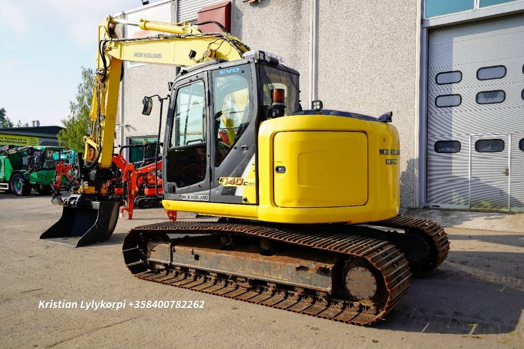 New Holland E140CSR PYÖRITTÄJÄLLÄ - Гусеничный экскаватор: фото 4 New Holland E140CSR PYÖRITTÄJÄLLÄ - Гусеничный экскаватор: фото 4