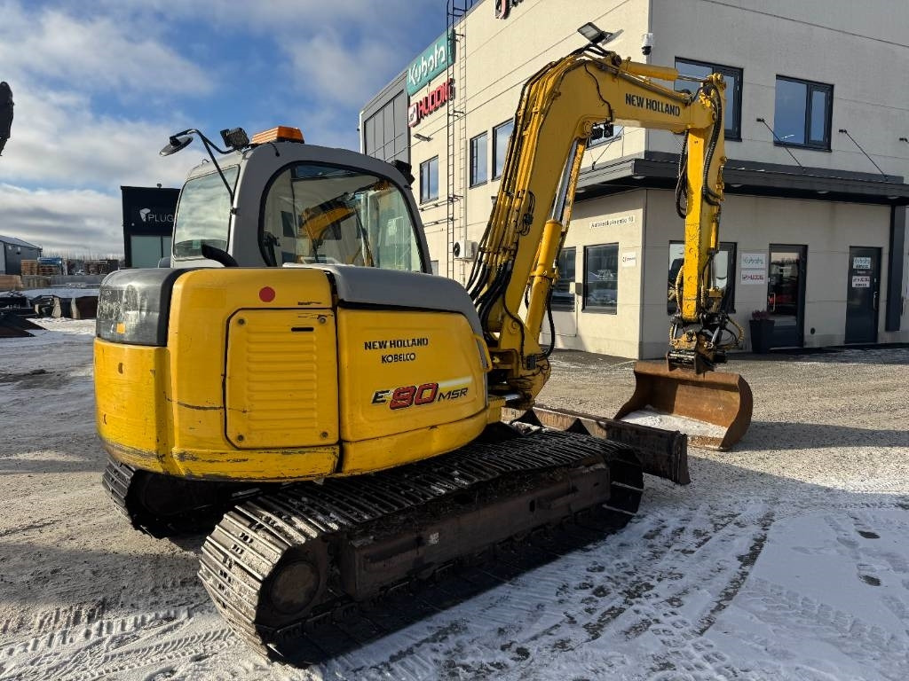 New Holland MYYTY! SOLD! E80MSR PYÖRITTÄJÄLLÄ - Мини-экскаватор: фото 5 New Holland MYYTY! SOLD! E80MSR PYÖRITTÄJÄLLÄ - Мини-экскаватор: фото 5