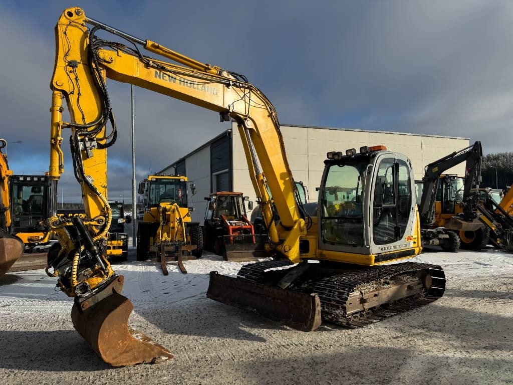 New Holland MYYTY! SOLD! E80MSR PYÖRITTÄJÄLLÄ - Мини-экскаватор: фото 2 New Holland MYYTY! SOLD! E80MSR PYÖRITTÄJÄLLÄ - Мини-экскаватор: фото 2