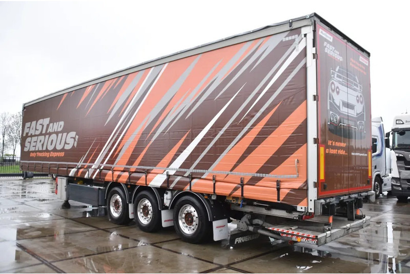 Fruehauf SLIDING CURTAINS/ROOF - TOPLIFT SYSTEM - LIFT AXLE - STEERING AXLE - SAF AXLES - ALCOA'S - DHOLLANDIA - TOP CONDITION - - Тентованный полуприцеп: фото 4 Fruehauf SLIDING CURTAINS/ROOF - TOPLIFT SYSTEM - LIFT AXLE - STEERING AXLE - SAF AXLES - ALCOA'S - DHOLLANDIA - TOP CONDITION - - Тентованный полуприцеп: фото 4