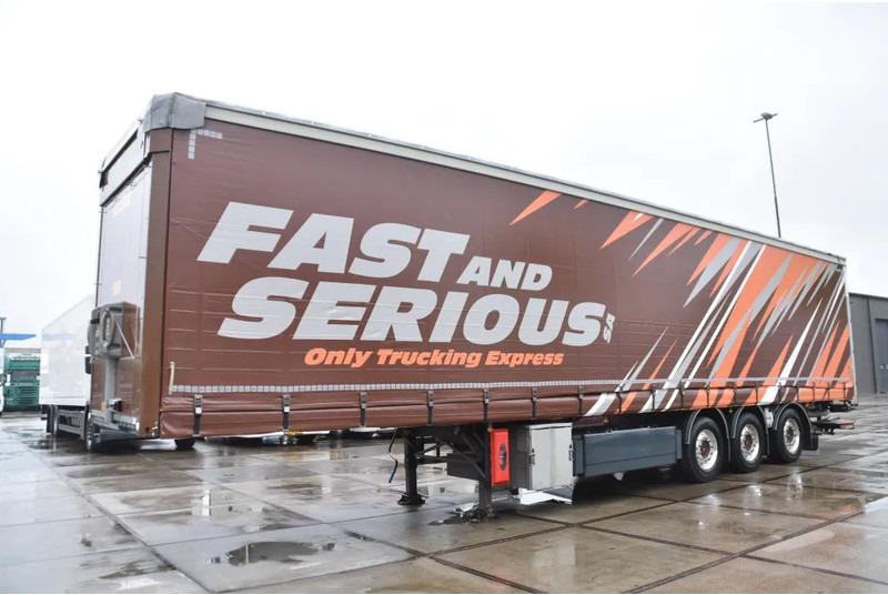 Fruehauf SLIDING CURTAINS/ROOF - TOPLIFT SYSTEM - LIFT AXLE - STEERING AXLE - SAF AXLES - ALCOA'S - DHOLLANDIA - TOP CONDITION - - Тентованный полуприцеп: фото 5 Fruehauf SLIDING CURTAINS/ROOF - TOPLIFT SYSTEM - LIFT AXLE - STEERING AXLE - SAF AXLES - ALCOA'S - DHOLLANDIA - TOP CONDITION - - Тентованный полуприцеп: фото 5