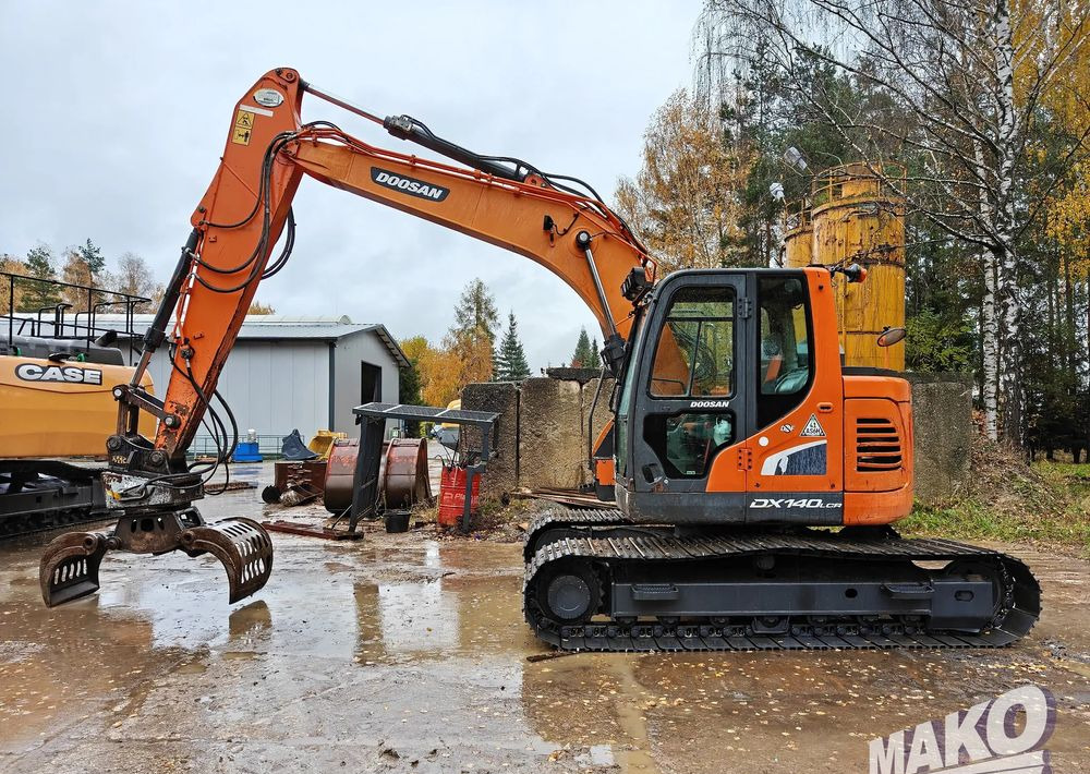 Doosan DX140LCR-5 - Гусеничный экскаватор: фото 1 Doosan DX140LCR-5 - Гусеничный экскаватор: фото 1