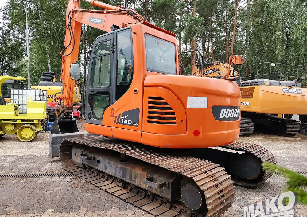 Doosan DX140LCR - Гусеничный экскаватор: фото 2 Doosan DX140LCR - Гусеничный экскаватор: фото 2