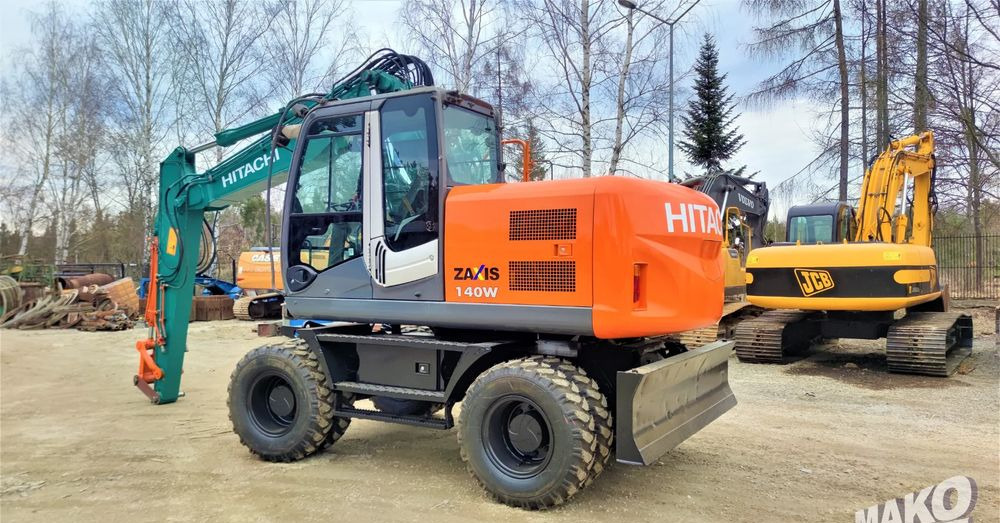 Hitachi ZX140W-3 - Колёсный экскаватор: фото 2 Hitachi ZX140W-3 - Колёсный экскаватор: фото 2