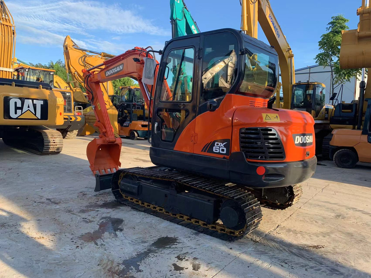 Doosan Doosan Excavator DX60 Yanmar Engine, 37.9 kW (51 HP) Engine, 0.21 m³ Bucket Capacity, 5,700 kg Operating Weight & Dimensions - Мини-экскаватор: фото 2 Doosan Doosan Excavator DX60 Yanmar Engine, 37.9 kW (51 HP) Engine, 0.21 m³ Bucket Capacity, 5,700 kg Operating Weight & Dimensions - Мини-экскаватор: фото 2
