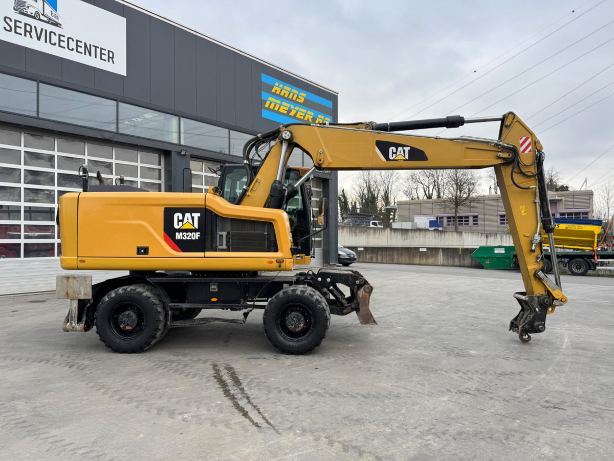 CATERPILLAR M320F Oilquick - Колёсный экскаватор: фото 3 CATERPILLAR M320F Oilquick - Колёсный экскаватор: фото 3