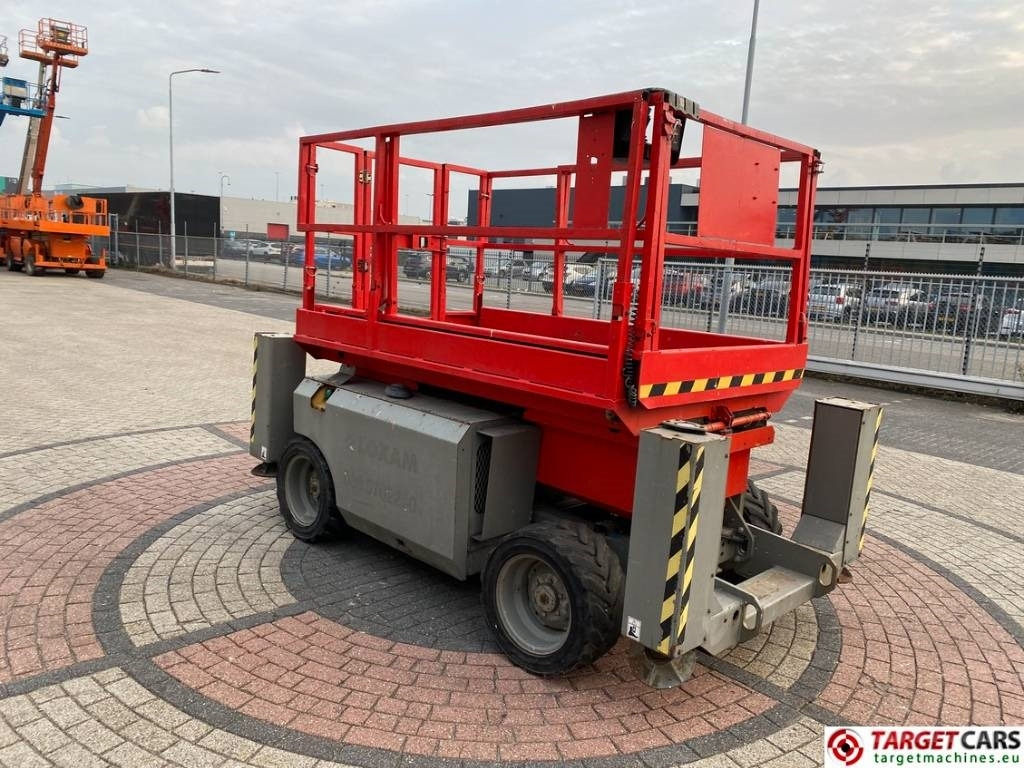 Genie GS-2668RT Diesel 4x4 Scissor Work Lift 992cm - Ножничный подъемник: фото 2 Genie GS-2668RT Diesel 4x4 Scissor Work Lift 992cm - Ножничный подъемник: фото 2