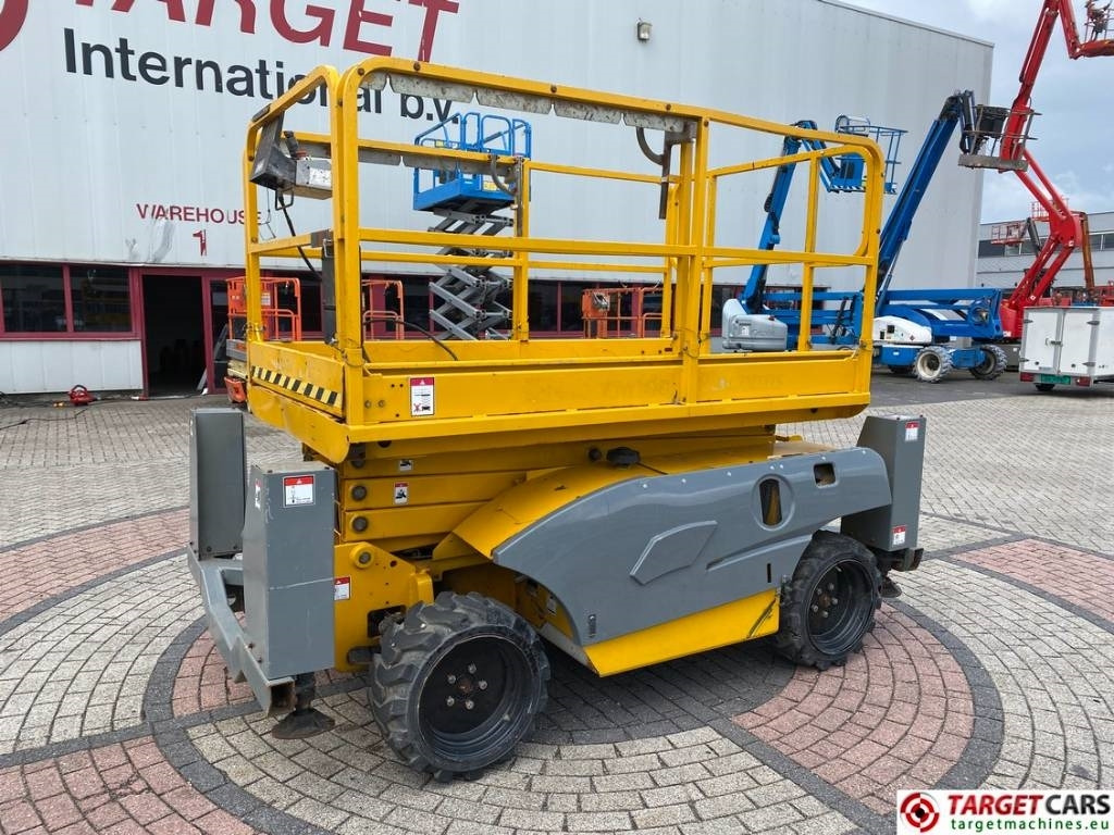 Haulotte Compact 10DX Diesel 4x4 Scissor Work Lift 1015cm - Ножничный подъемник: фото 1 Haulotte Compact 10DX Diesel 4x4 Scissor Work Lift 1015cm - Ножничный подъемник: фото 1