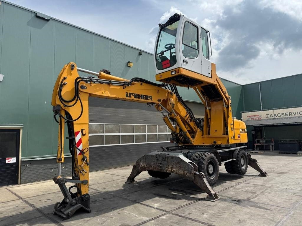 Liebherr A 316 - Перегружатель: фото 2 Liebherr A 316 - Перегружатель: фото 2