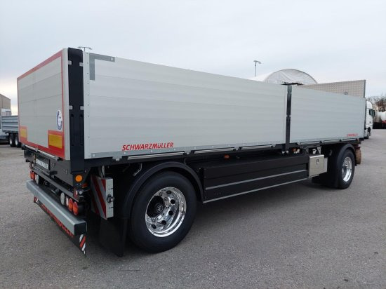 Schwarzmüller 2-Achs Jumbo-Baustoff-Plateauanhänger, BPW-Achsen, Alufelgen, - Прицеп бортовой/ Платформа: фото 4 Schwarzmüller 2-Achs Jumbo-Baustoff-Plateauanhänger, BPW-Achsen, Alufelgen, - Прицеп бортовой/ Платформа: фото 4