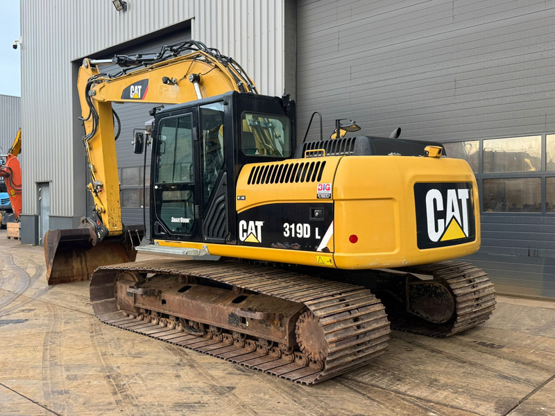 Caterpillar 319DL - Гусеничный экскаватор: фото 3 Caterpillar 319DL - Гусеничный экскаватор: фото 3