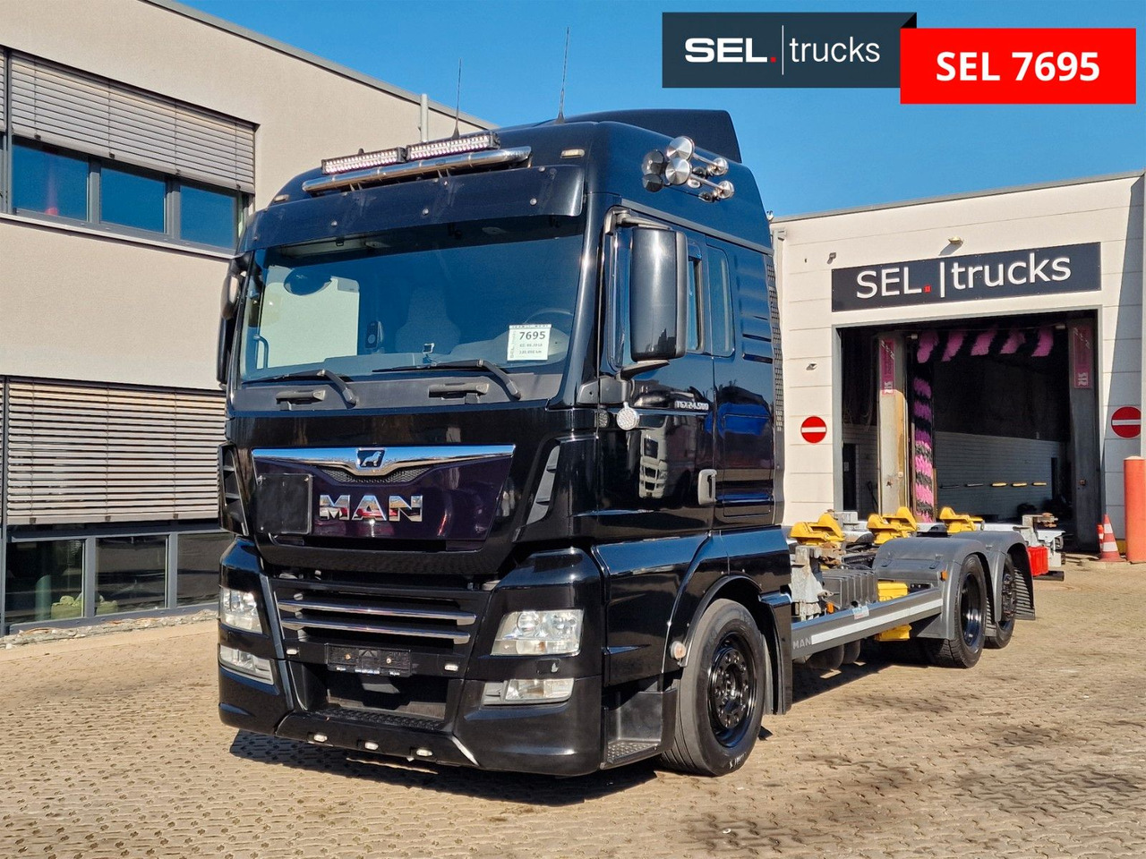 MAN TGX 24.500 6X2-2 LL-U / Intarder / Xeno / LOW KM - Грузовик-контейнеровоз/ Сменный кузов: фото 1 MAN TGX 24.500 6X2-2 LL-U / Intarder / Xeno / LOW KM - Грузовик-контейнеровоз/ Сменный кузов: фото 1