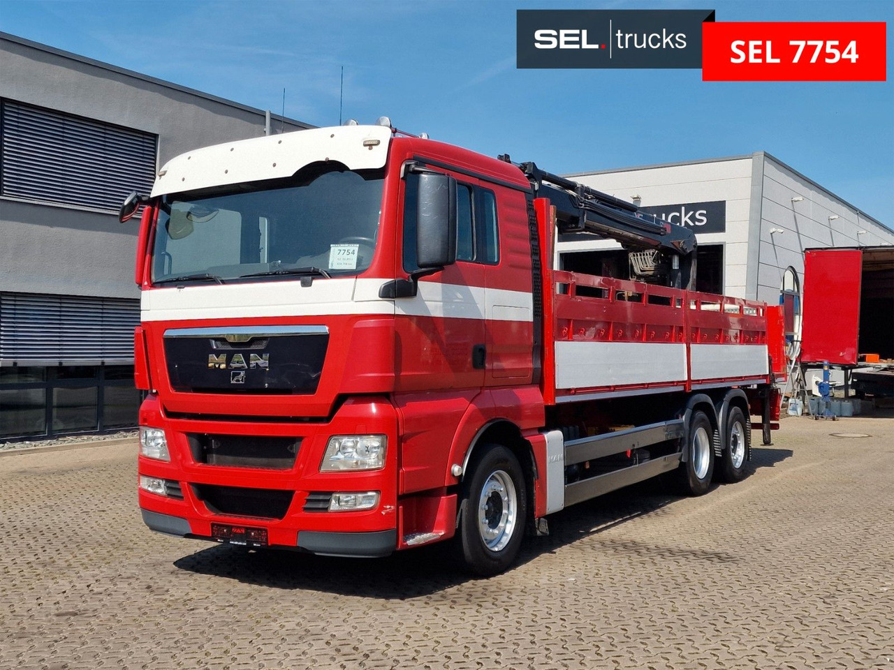 MAN TGX 26.400 6x2-2 BL/ Intarder / HIAB / Lenkachse - Автоманипулятор: фото 1 MAN TGX 26.400 6x2-2 BL/ Intarder / HIAB / Lenkachse - Автоманипулятор: фото 1