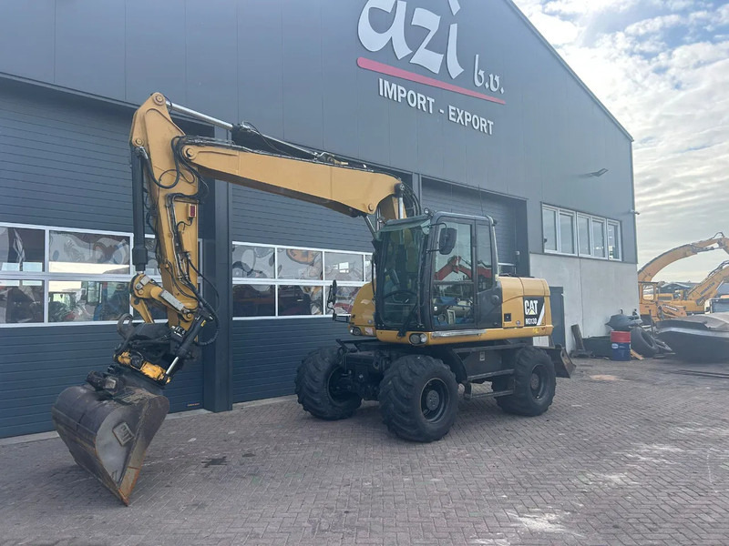 Caterpillar M313D - Колёсный экскаватор: фото 1 Caterpillar M313D - Колёсный экскаватор: фото 1