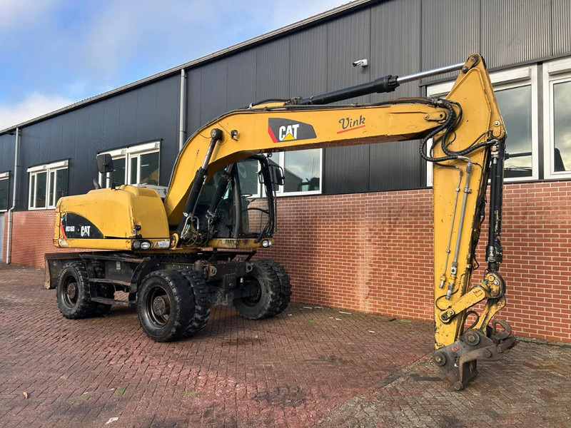 Caterpillar M316D - Колёсный экскаватор: фото 3 Caterpillar M316D - Колёсный экскаватор: фото 3