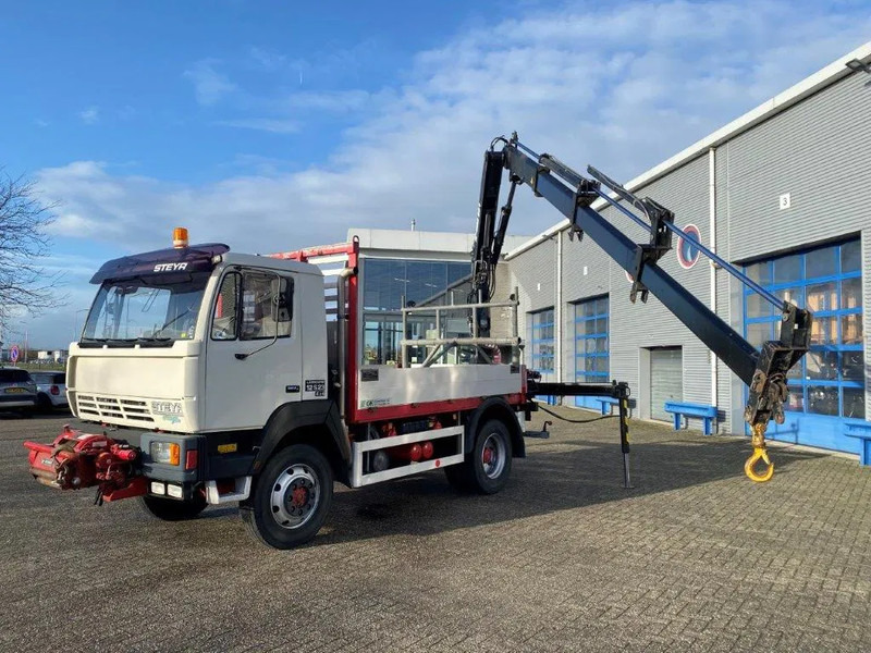 Steyr LÄRMARM 12S23 / 4X4 / CRANE HIAB 092 / WINCH / ONLY: 117406KM / TOP CONDITION / BIG AXLE / FULL STEEL+DRUM BRAKES / MANUAL / EUR - Автоманипулятор: фото 1 Steyr LÄRMARM 12S23 / 4X4 / CRANE HIAB 092 / WINCH / ONLY: 117406KM / TOP CONDITION / BIG AXLE / FULL STEEL+DRUM BRAKES / MANUAL / EUR - Автоманипулятор: фото 1