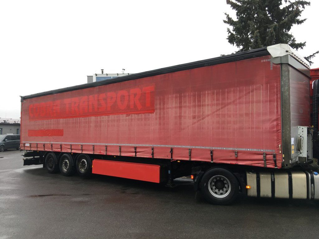 Schmitz Cargobull SCB*S3T standard/lifting roof/Hubdach 2,70-2,85m - Тентованный полуприцеп: фото 2 Schmitz Cargobull SCB*S3T standard/lifting roof/Hubdach 2,70-2,85m - Тентованный полуприцеп: фото 2