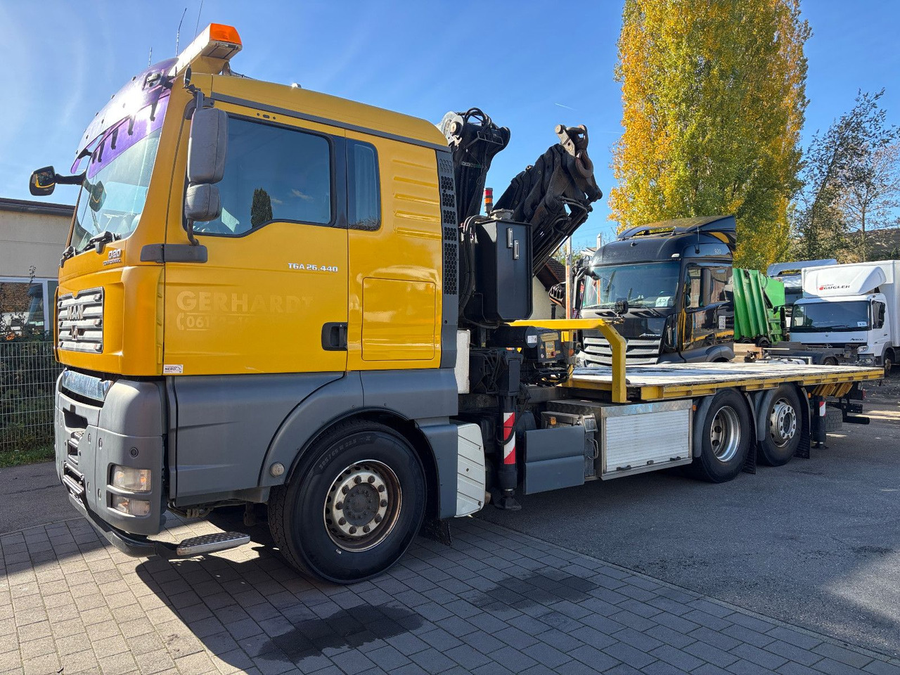 MAN TGA 26.440 FASSI F450AXP Containerauf./Lenkachse - Автоманипулятор: фото 1 MAN TGA 26.440 FASSI F450AXP Containerauf./Lenkachse - Автоманипулятор: фото 1
