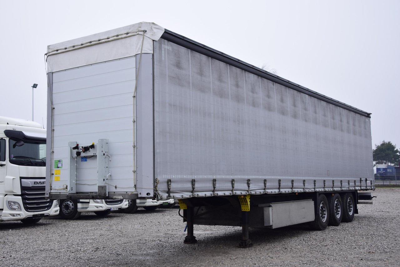 Schmitz Cargobull SCS24/L Lifting Axle - Тентованный полуприцеп: фото 1 Schmitz Cargobull SCS24/L Lifting Axle - Тентованный полуприцеп: фото 1