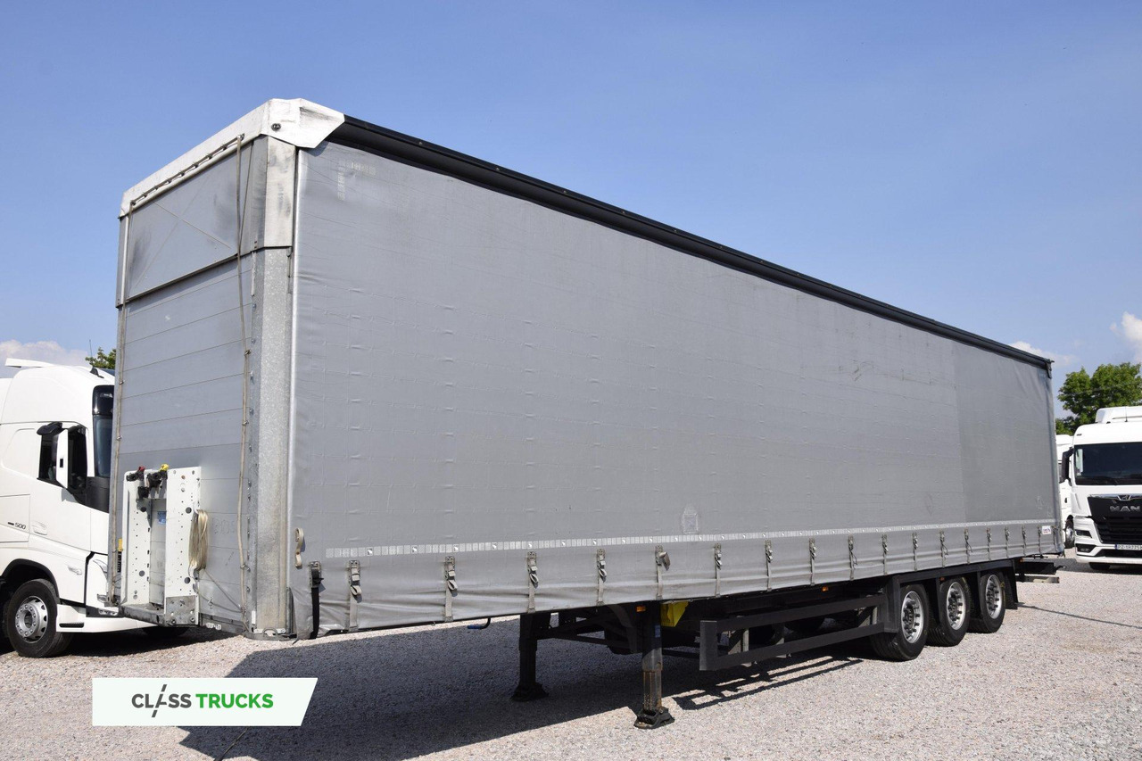 Schmitz Cargobull SCS24/L Varios - Тентованный полуприцеп: фото 1 Schmitz Cargobull SCS24/L Varios - Тентованный полуприцеп: фото 1