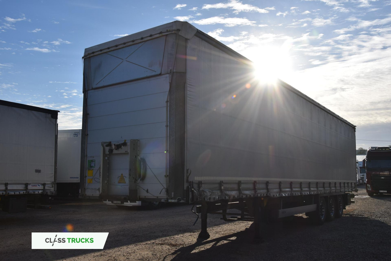 Schmitz Cargobull SCS24/L Varios - Тентованный полуприцеп: фото 1 Schmitz Cargobull SCS24/L Varios - Тентованный полуприцеп: фото 1