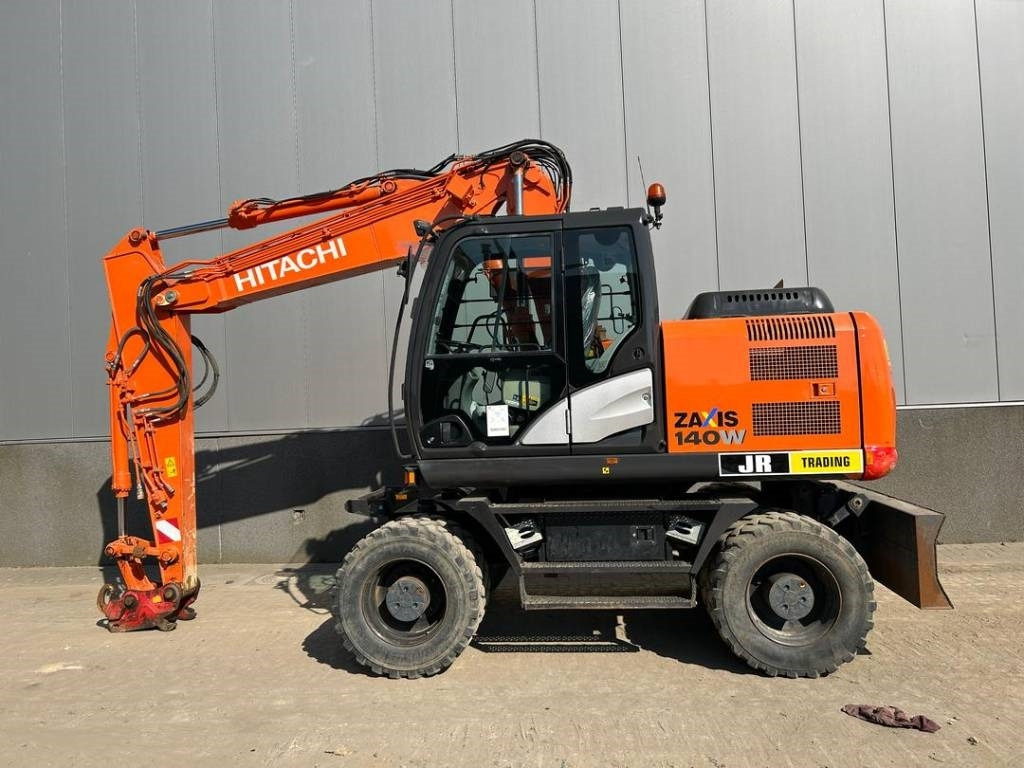 Hitachi ZX 140 W-5B - Колёсный экскаватор: фото 1 Hitachi ZX 140 W-5B - Колёсный экскаватор: фото 1