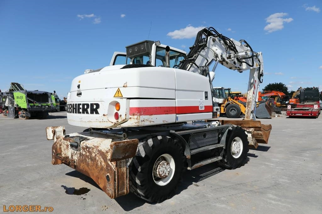 Liebherr A 314 - Колёсный экскаватор: фото 3 Liebherr A 314 - Колёсный экскаватор: фото 3