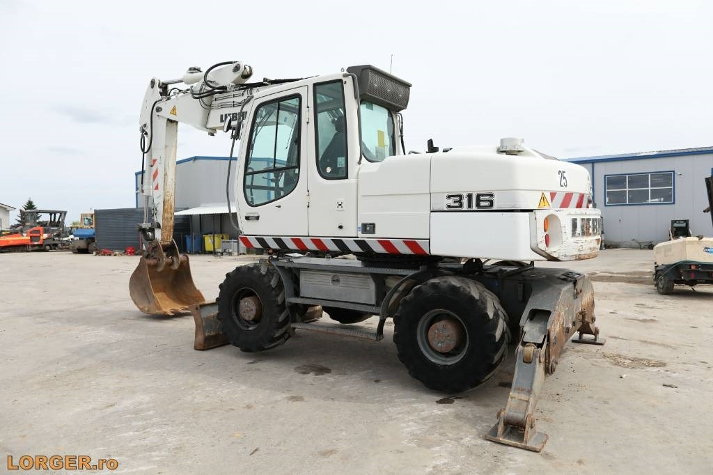 Liebherr A 316 Litronic - Колёсный экскаватор: фото 3 Liebherr A 316 Litronic - Колёсный экскаватор: фото 3