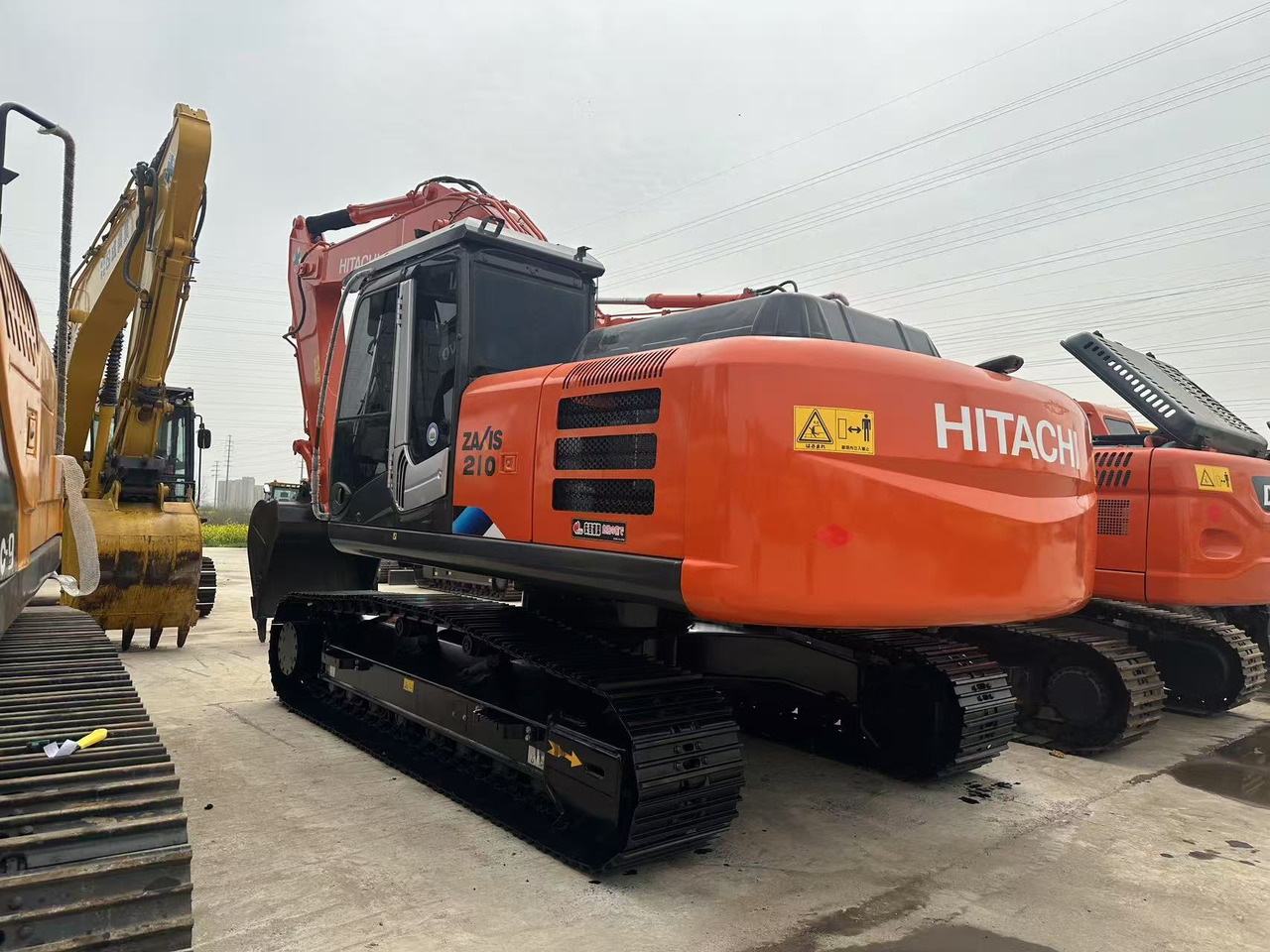 HITACHI ZA210 - Колёсный экскаватор: фото 1 HITACHI ZA210 - Колёсный экскаватор: фото 1