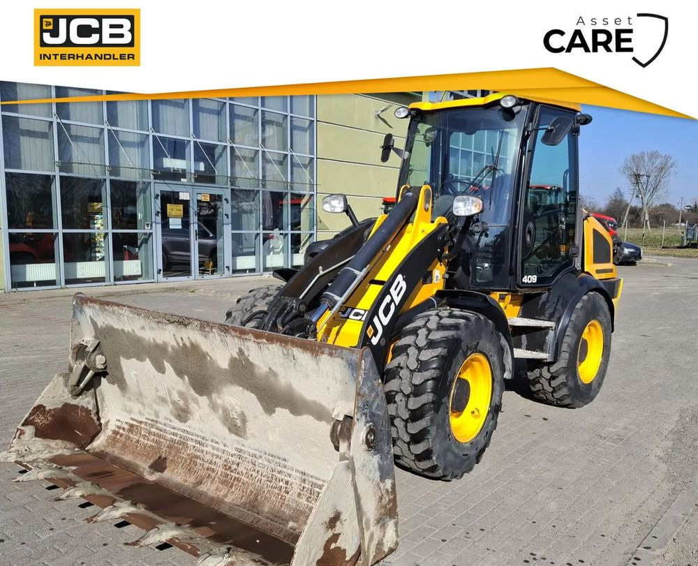 JCB 409 - Колёсный экскаватор: фото 1 JCB 409 - Колёсный экскаватор: фото 1