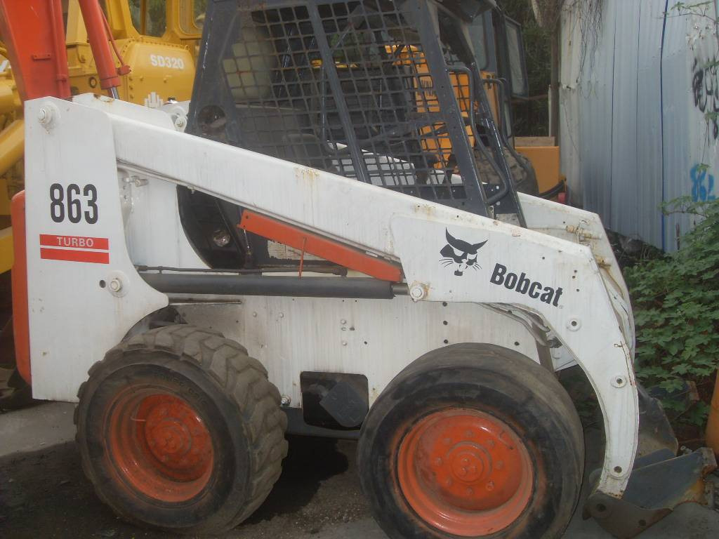 Bobcat 863 - Мини-погрузчик с бортовым поворотом: фото 1 Bobcat 863 - Мини-погрузчик с бортовым поворотом: фото 1