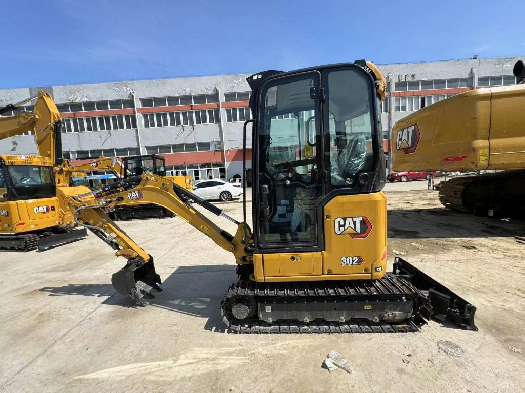 CAT 302 - Мини-экскаватор: фото 2 CAT 302 - Мини-экскаватор: фото 2