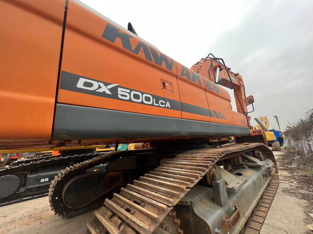 Doosan DX 500 LCA - Гусеничный экскаватор: фото 1 Doosan DX 500 LCA - Гусеничный экскаватор: фото 1