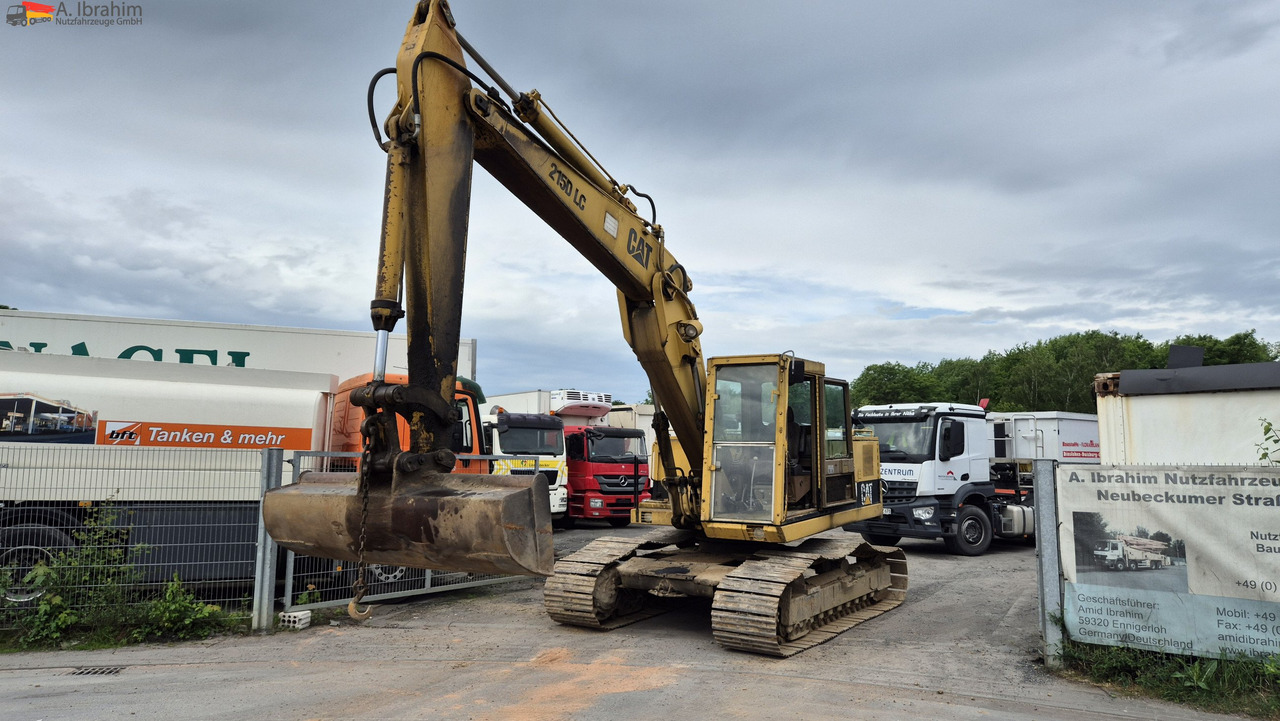 CAT 215 DLC Zustand normal, Hydraulik trocken Video vorhanden - Гусеничный экскаватор: фото 1 CAT 215 DLC Zustand normal, Hydraulik trocken Video vorhanden - Гусеничный экскаватор: фото 1