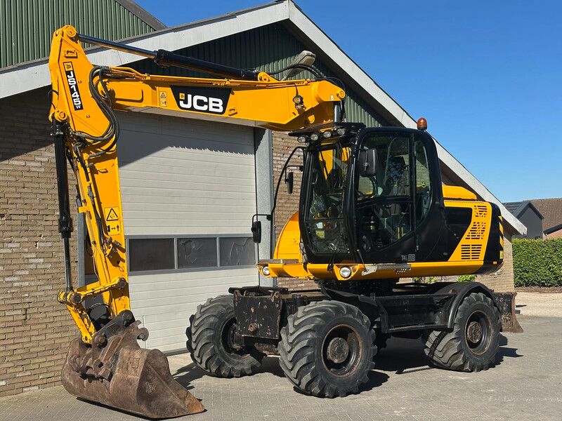 JCB JS145 JS145W - Колёсный экскаватор: фото 1 JCB JS145 JS145W - Колёсный экскаватор: фото 1