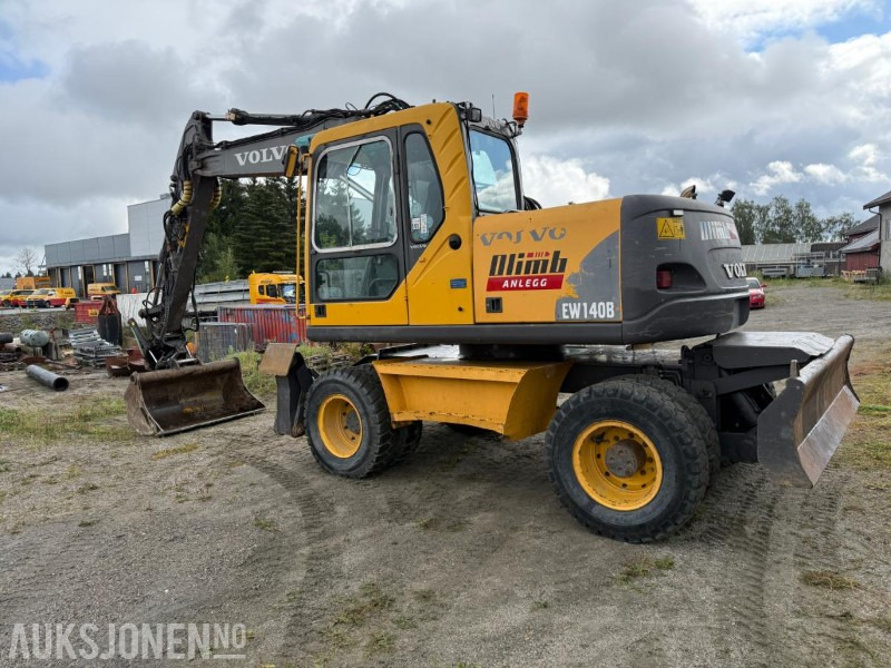 2006 Volvo EW140B Hjulgraver m/pallegaffel og skuff - Steelwrist tiltrotator. - Экскаватор: фото 5 2006 Volvo EW140B Hjulgraver m/pallegaffel og skuff - Steelwrist tiltrotator. - Экскаватор: фото 5